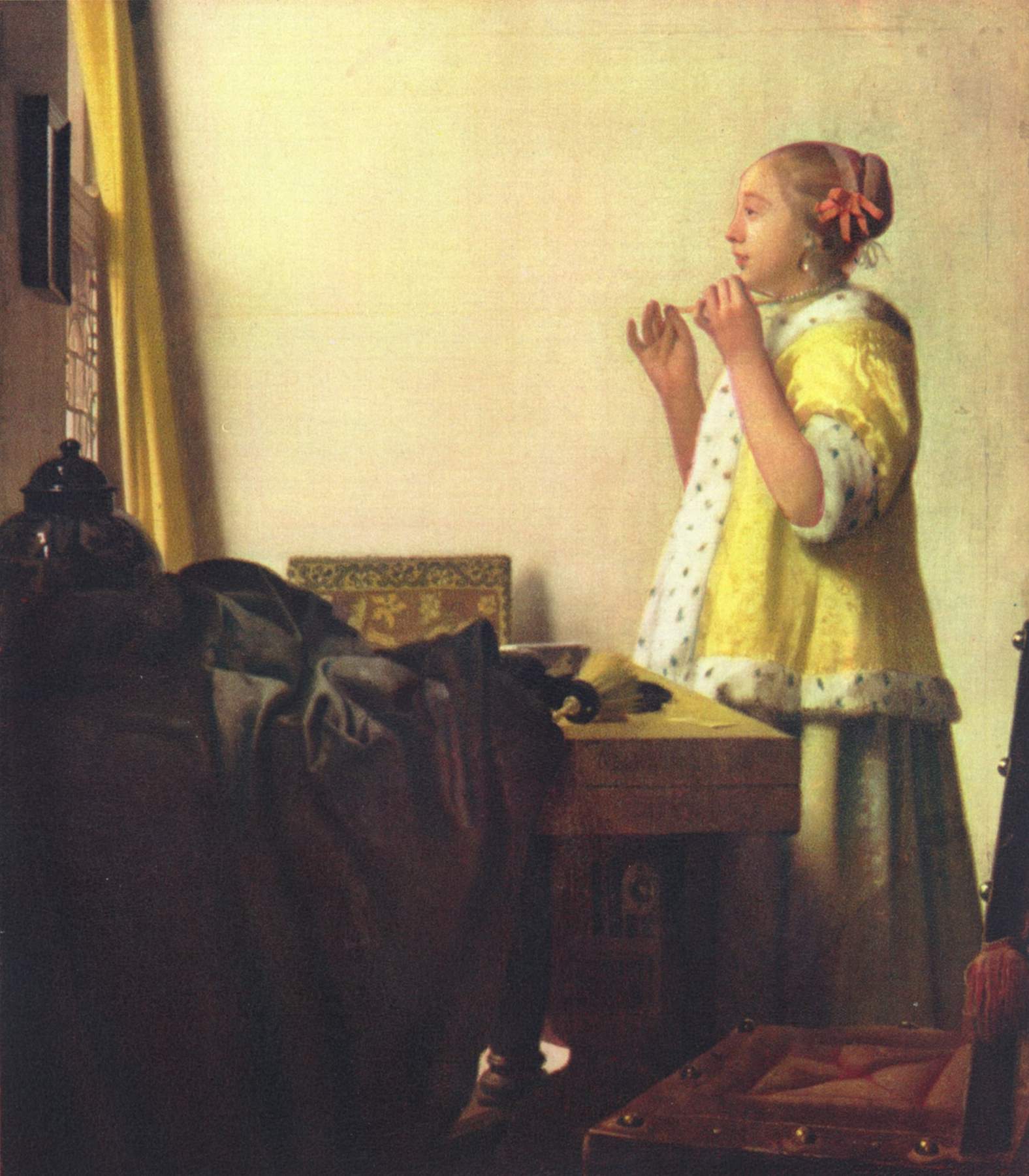 Die Junge Dame mit Perlenhalsband ist ein Ölgemälde von Jan Vermeer, das zwischen 1662 und 1665 entstand