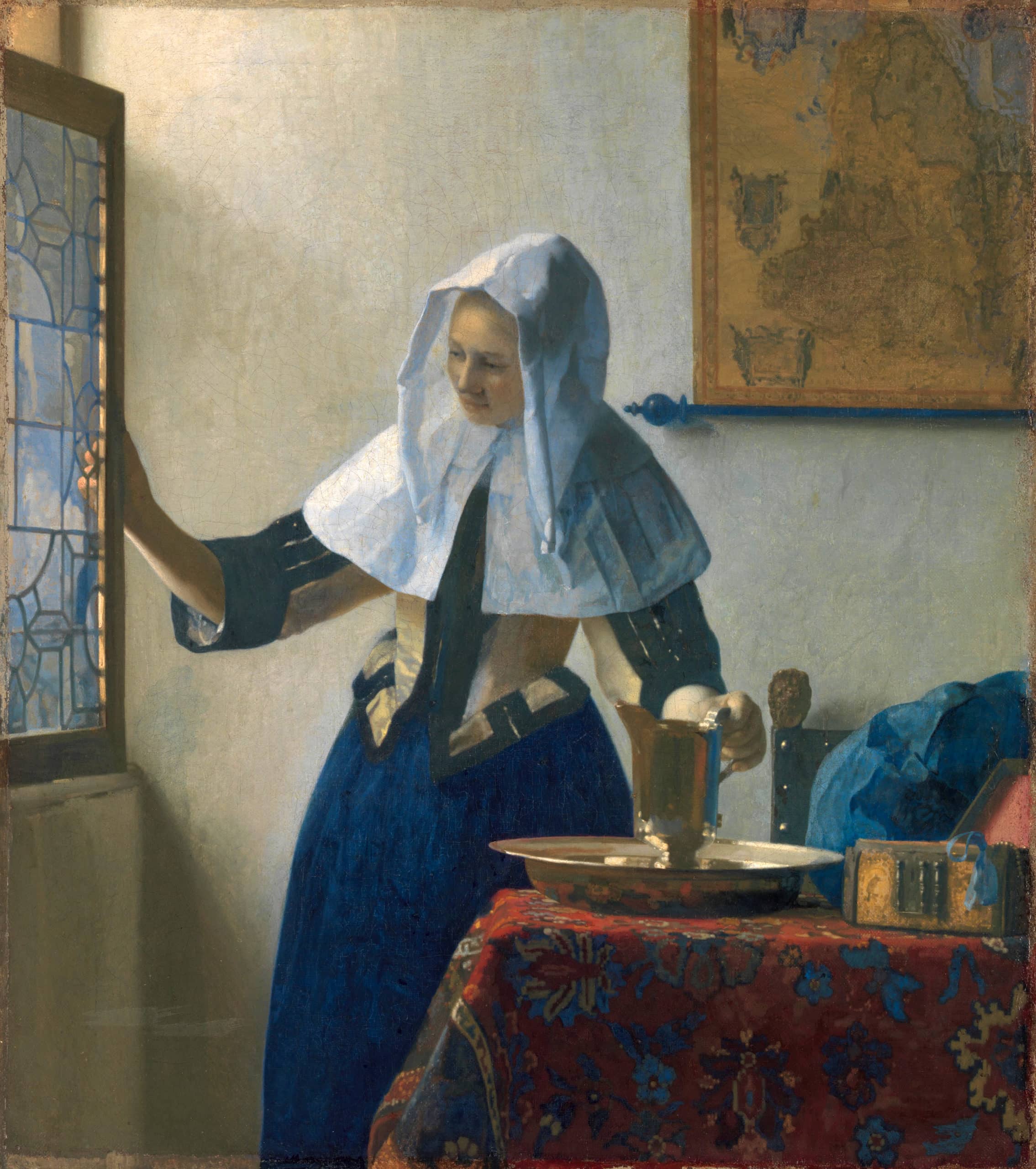 Junge Frau mit Wasserkanne am Fenster - Gemälde von Jan Vermeer