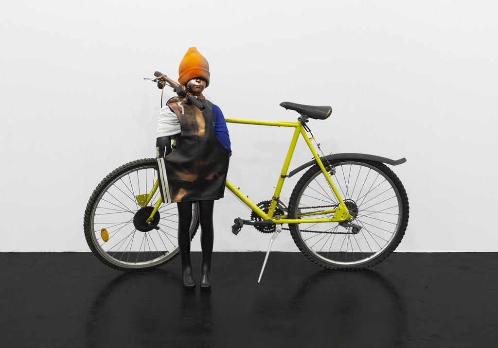Isa Genzken Untitled, 2018 mannequin, clothes, bicycle and spray paint 121 x 170 x 60 cm Monika Schnetkamp Collection Courtesy Galerie Buchholz © VG Bild-Kunst, Bonn 2023