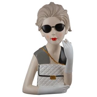 The poly figure &quot;Lady with handbag&quot; in the appealing colors gray, black and white is an outstanding example of modern decoration.