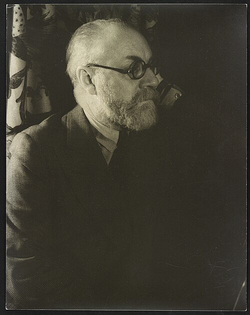 Fotografisches Portrait von Henri Matisse mit Brille (1933)
