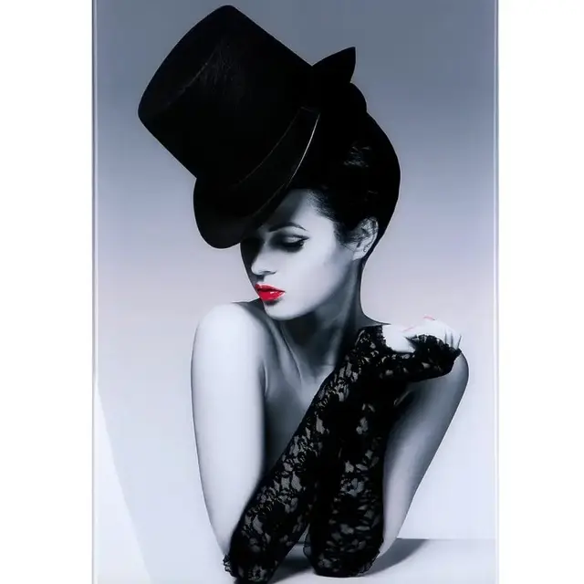 Elegant acrylic image "Lady with cylinder" with high -quality aluminum frame⁣ ⁣ The acrylic image "Lady with cylinder" shows a graceful beauty that occurs in a minimalist presentation with cylinder and gloves. The young lady, depicted in black and white with nuanced shades, sets a strong color accent with her strikingly red-made mouth. ⁣ ⁣ This portrait picture, harmoniously integrated into a stylish surroundings, skilfully appear. The graceful figure stimulates to set new accents in the decoration and redesign of the room. With this hand -painted acrylic image in high -quality aluminum frames, you give interior a fresh appearance. #contemporaryreism #modernecunst #Canvas Canvas art #buyart #kunstkauf #acryliconcanvas #urbanbeauty #wandbild #wanddeko